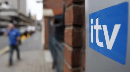 An ITV logo is seen on their Central news building in Birmingham, central England September 30, 2008. REUTERS/Stephen Hird