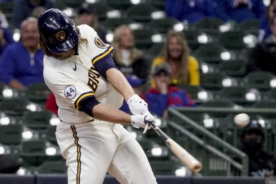 Milwaukee Brewers' Corbin Burnes hits an two-run scoring single during the sixth inning of a baseball game against the Chicago Cubs Wednesday, April 14, 2021, in Milwaukee. (AP Photo/Morry Gash)