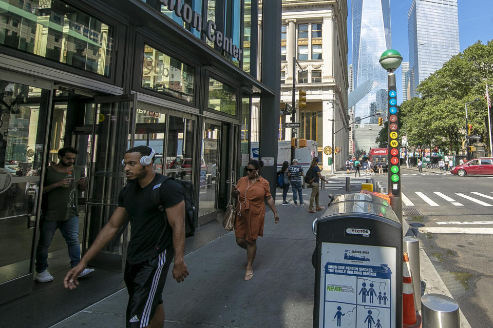 <p>People exit and walk past the Fulton Street subway hub on Sept. 5, 2018. (Photo: Gordon Donovan/Yahoo News) </p>