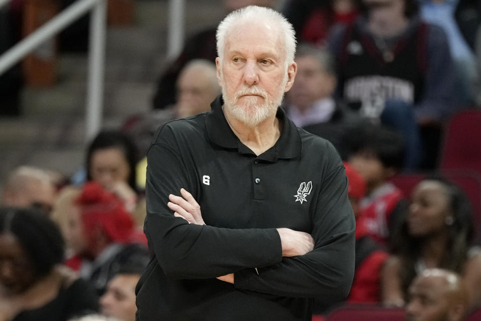 San Antonio Spurs head coach Greg Popovich watches from the sideline during the first half of an NBA basketball game against the Houston Rockets, Monday, Dec. 19, 2022, in Houston. (AP Photo/Eric Christian Smith)