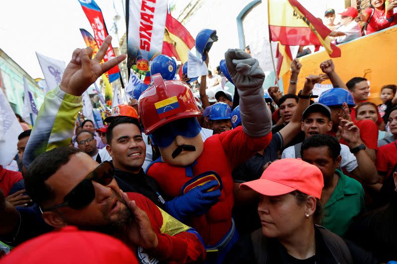 FILE PHOTO: People attend a rally in support of Venezuela's President Maduro, in Caracas