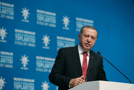 Turkish President Tayyip Erdogan addresses mayors from his ruling AK Party at the Presidential Palace in Ankara, Turkey, September 13, 2017. Yasin Bulbul/Presidential Palace/Handout via REUTERS