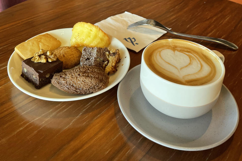 Lovely high tea session with some sweet snacks and Rose Oat Milk Latte at Club Med Lijiang. (Photo: Lim Yian Lu)