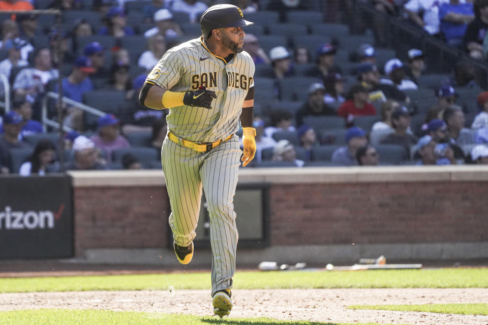 San Diego Padres designated hitter Nelson Cruz runs to first base after his single in the 8th inning, during a baseball game against New York Mets, Wednesday, April 12, 2023, in New York. (AP Photo/Bebeto Matthews)