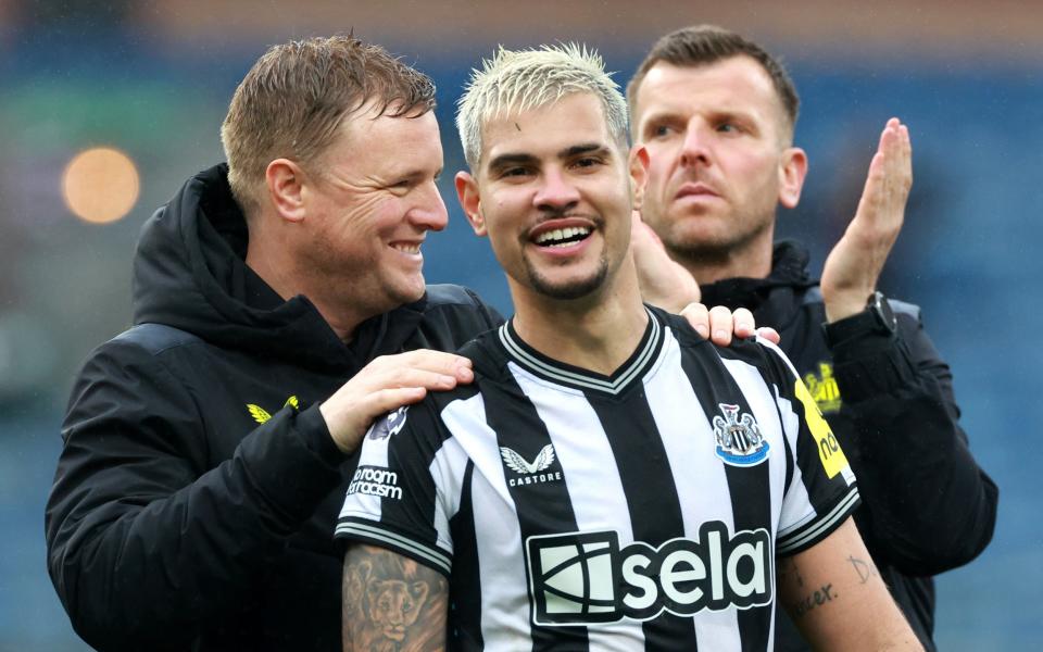 Eddie Howe and Bruno Guimaraes after Newcastle's win at Burnley