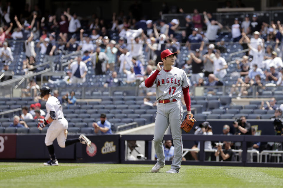 Los Angeles Angels pitcher Shohei Ohtani (17) reacts after giving up a home run to New York Yankees' Aaron Judge during the third inning of the first baseball game of a doubleheader on Thursday, June 2, 2022, in New York. (AP Photo/Adam Hunger)