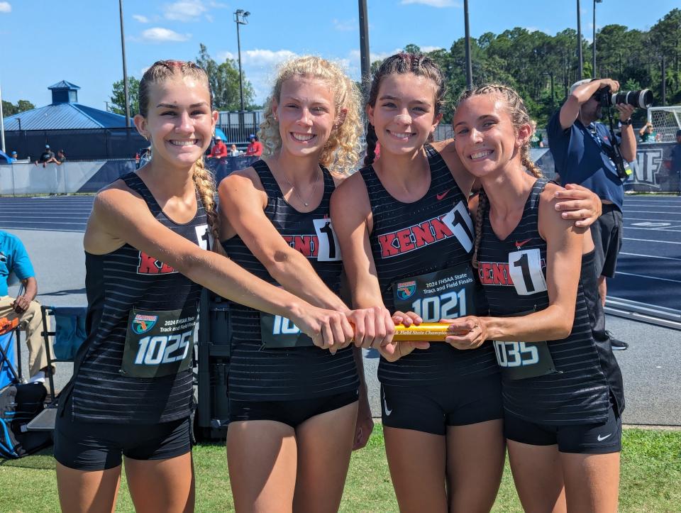 Bishop Kenny teammates Taylor Lawhon, Davis Johnson, Alexis Holmes and Emily Wheldon hold the baton after winning the girls 4x800-meter relay during the FHSAA Class 2A high school track and field championships on May 16, 2024. [Clayton Freeman/Florida Times-Union]