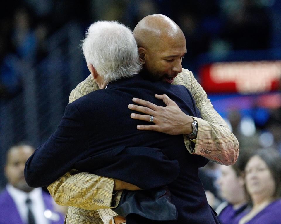 New Orleans Hornets head coach Monty Williams hugs San Antonio Spurs head coach Gregg Popovich after an NBA basketball game in New Orleans on Jan. 7, 2013. The Hornets defeated the Spurs 95-88.