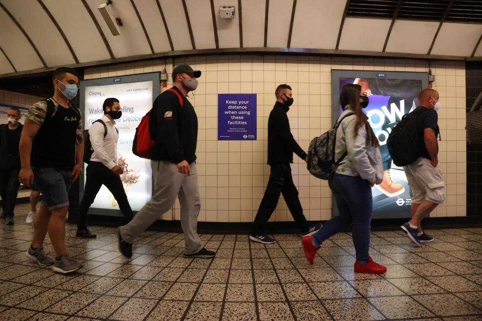 Passengers wearing face masks on the London Underground (Nigel Howard)