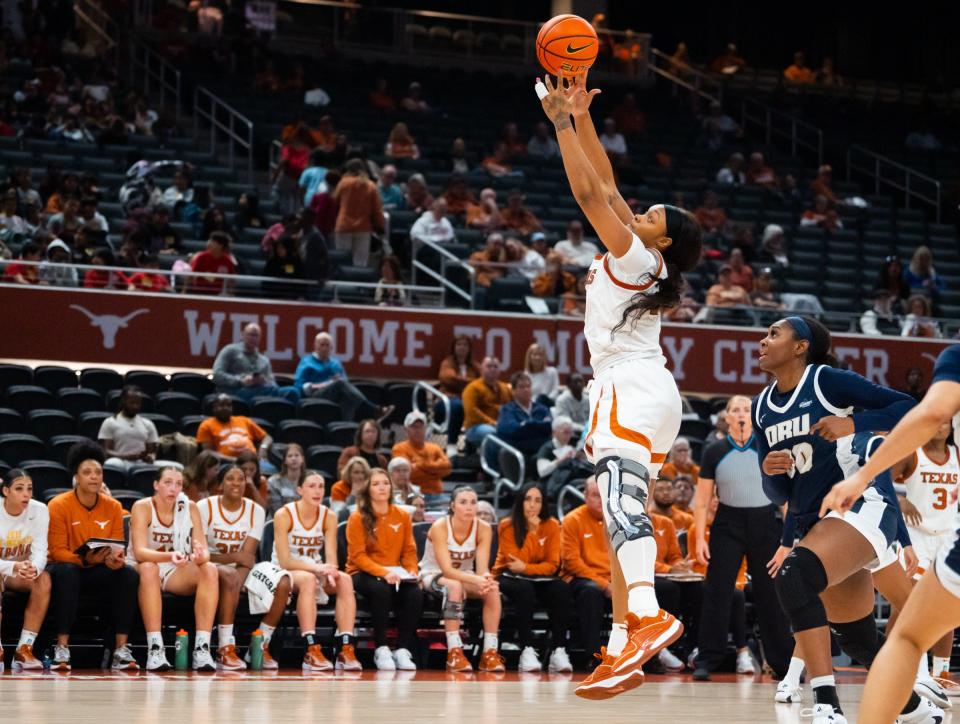 Texas forward Aaliyah Moore catches a pass with her fingertips during the second half of the Longhorns' Nov. 29 win over Oral Roberts. Moore is working her way back from a December 2022 ACL injury.