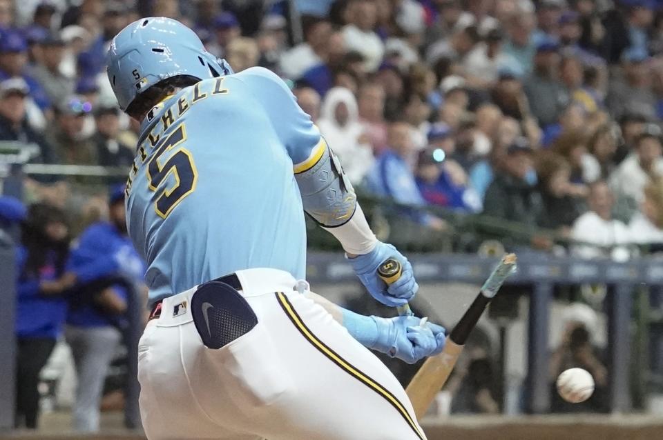 Milwaukee Brewers' Garrett Mitchell breaks his bat as he grounds out during the second inning of a baseball game against the Chicago Cubs Friday, Sept. 29, 2023, in Milwaukee. (AP Photo/Morry Gash)