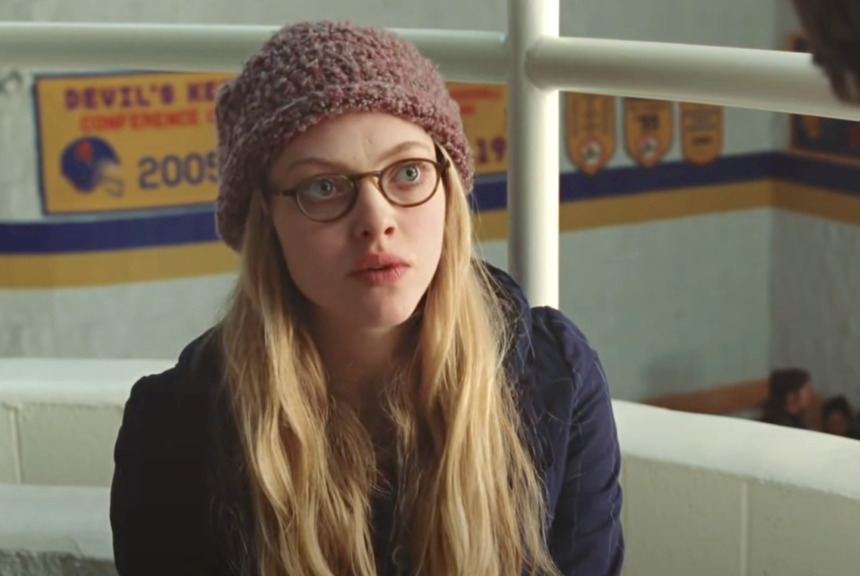 closeup of her in character wearing a beanie and glasses