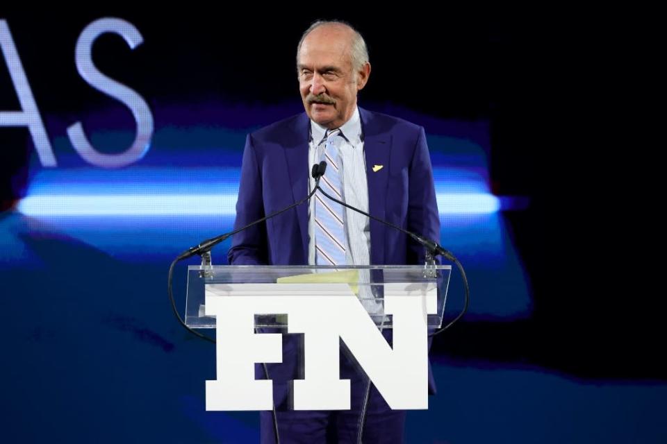 Stan Smith speaks onstage at the 35th annual Footwear News Achievement Awards - Credit: Getty Images for Footwear News