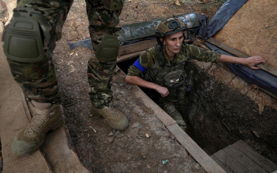 Ukrainian troops man a position near the frontline in the southern Zaporizhzhia region