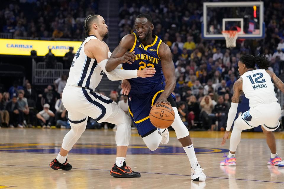 Draymond Green drives against Grizzlies forward Dillon Brooks during a game this past January.