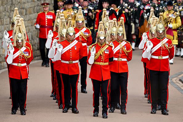 WINDSOR, ENGLAND - SEPTEMBER 19: Dismounted detachment of the Household Cavalry are seen at Windsor Castle on September 19, 2022 in Windsor, England. The committal service at St George's Chapel, Windsor Castle, took place following the state funeral at Westminster Abbey. A private burial in The King George VI Memorial Chapel followed. Queen Elizabeth II died at Balmoral Castle in Scotland on September 8, 2022, and is succeeded by her eldest son, King Charles III. (Photo by Leon Neal/Getty Images)