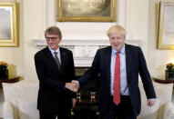 Britain's Prime Minister Boris Johnson, right, shakes hands with the President of the European Parliament David Sassoli, ahead of a private meeting in Downing Street, Tuesday Oct. 8, 2019. (Aaron Chown/Pool via AP)