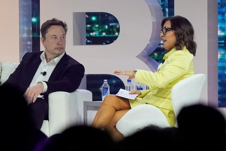 Linda Yaccarino and Elon Musk at a previous event (AP)