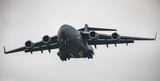 An RAF C-17A Globemaster III heavy lift aircraft, flown by 99 Squadron, landing at RAF Brize Norton, Oxfordshire (Cpl Matty Matthews/PA)