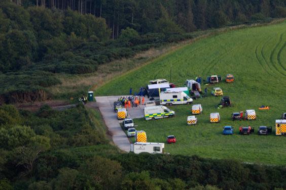 Emergency services in the area of the scene of a derailed passenger train near Stonehaven (EPA)