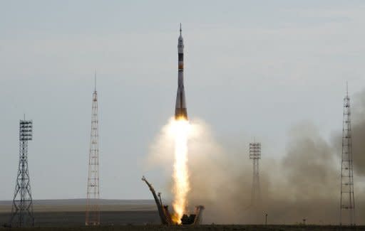 The Soyuz TMA-05M spacecraft blasts off from the Russian leased Kazakh Baikonur cosmodrome on July 15. The rocket blasted off with an international crew of three toward the International Space Station on Sunday in a mission testing the reliability of Russia's crisis-prone space programme