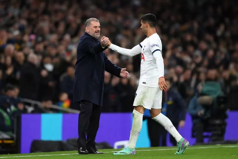 Tottenham boss Ange Postecoglou celebrates with Cristian Romero after Richarlison scored the third goal vs Newcastle