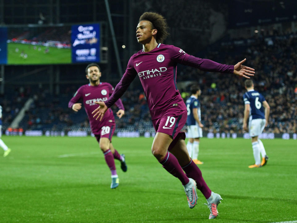 Leroy Sane celebrates his winner for City: Getty