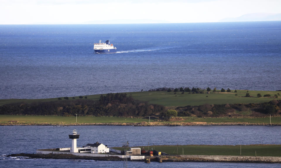 FILE - In this Friday, Jan. 1, 2021 file photo, a P&O ferry from Scotland crosses the Irish Sea making way towards the port at Larne on the north coast of Northern Ireland. Britain and the European Union are once again trading insults and accusations as they wrangle over Brexit. The conflict centers on Northern Ireland, the only part of the U.K. that shares a border with an EU member. Britain says new customs checks and other barriers to goods entering Northern Ireland from the rest of the U.K. are causing economic hardship and undermining the peace process. (AP Photo/Peter Morrison, File)