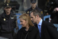 FILE - In this Feb. 9, 2016 file photo, Spain's Princess Cristina and her husband Inaki Urdangarin, leave a courtroom after attending a corruption trial, in Palma de Mallorca, Spain. A Spanish court on Friday Feb. 17, 2017, found Princess Cristina not guilty in a tax fraud case in which her husband, the brother-in-law of King Felipe VI, was sentenced Friday to 6 years and 3 months in prison for evading taxes, fraud and various other charges. (AP Photo/Joan Llado, File)