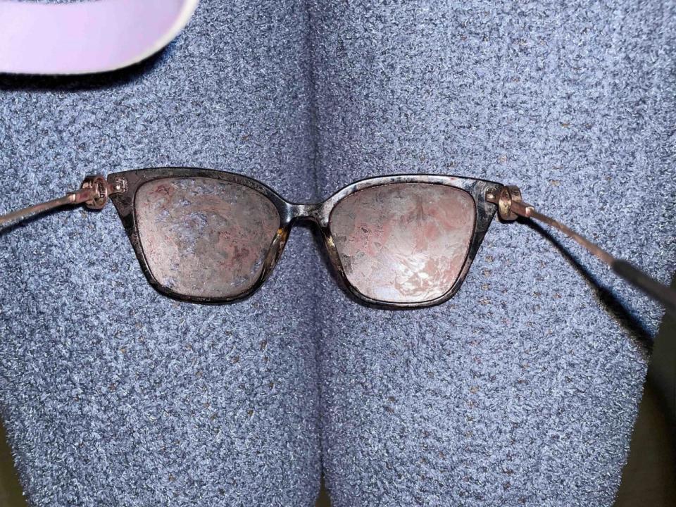 PHOTO: Desaturated image of Michelle Folson's glasses after the alleged assault, which included a facial fracture, concussive symptoms, bruising and lacerations to the head, and significant blood loss, according to a medical physician's letter. (Michelle Folson)