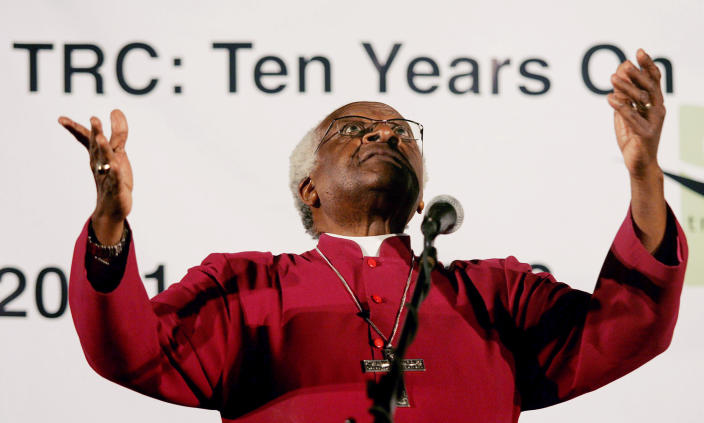 FILE - Desmond Tutu gestures during a public debate on the legacy of the Truth and Reconciliation Commission in Cape Town, South Africa, April, 20, 2006. Tutu chaired the commission, which solicited searing testimonials of violence from both victims and perpetrators as a way to heal the country after apartheid ended in 1994, holding out the possibility of amnesty for those who confessed to human rights violations and showed remorse. Yet Tutu acknowledged the commission left people on both sides of the conflict dissatisfied. (AP Photo/Obed Zilwa, File)