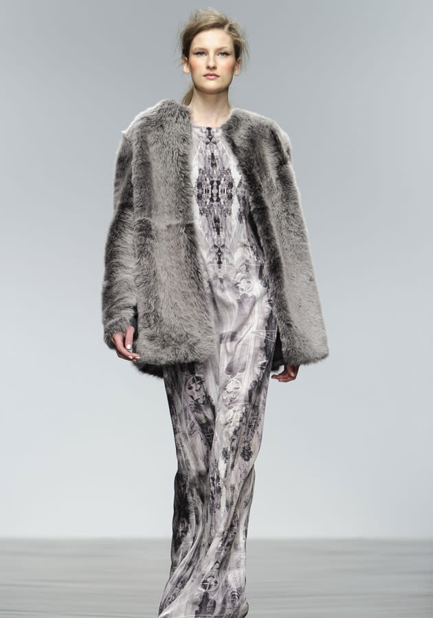 <b>London Fashion Week AW13: Zoe Jordan</b><br><br>Zoe Jordan's AW13 collection featured a stylish, muted colour palette - with this model showcasing a graphic-print silk maxi and fur coat.<br><br>©Rex