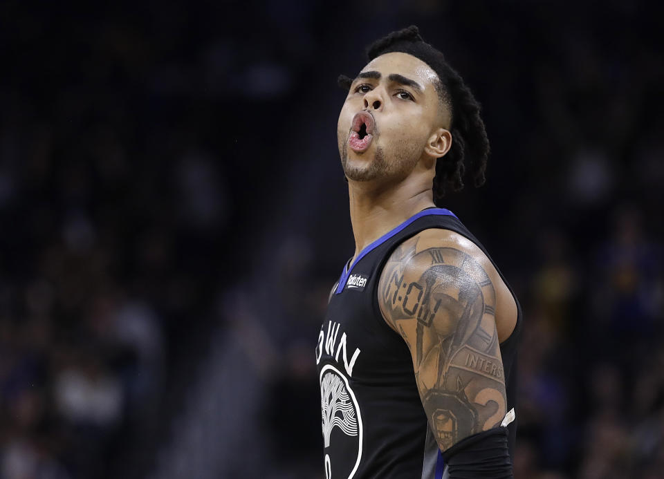 Golden State Warriors' D'Angelo Russell reacts to a score against the New York Knicks in the second half of an NBA basketball game, Wednesday, Dec. 11, 2019, in San Francisco. (AP Photo/Ben Margot)