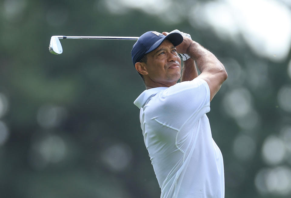 AUGUSTA, GEORGIA - APRIL 06: Tiger Woods of The United States plays his tee shot on the fourth hole during the first round of the 2023 Masters Tournament at Augusta National Golf Club on April 06, 2023 in Augusta, Georgia. (Photo by David Cannon/Getty Images)