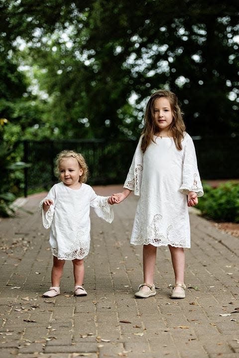 At the time they were diagnosed with Niemann-Pick C1, a rare genetic disease, both Abby and Belle were still able to walk. Now Belle uses a wheelchair.