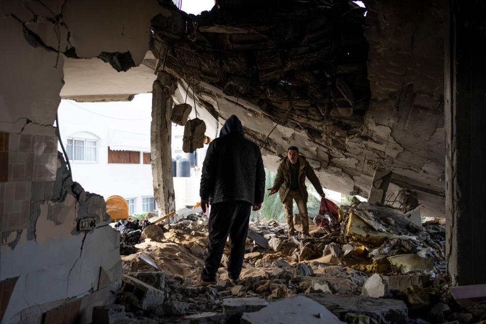Palestinians check destruction after an Israeli strike in Rafah, Gaza Strip, Saturday, Feb.10, 2024. (AP Photo/Fatima Shbair)
