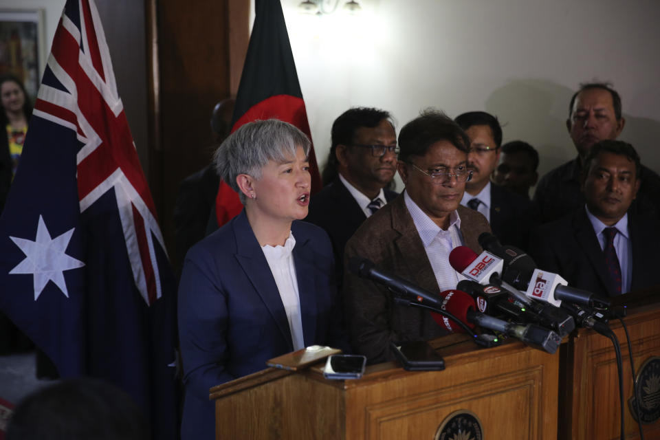 Australian Foreign Minister Penny Wong, left, and Bangladeshi Foreign Minister Hasan Mahmud address the media after their meeting in Dhaka, Bangladesh, Tuesday, May 21, 2024. (AP Photo/Mahmud Hossain Opu)