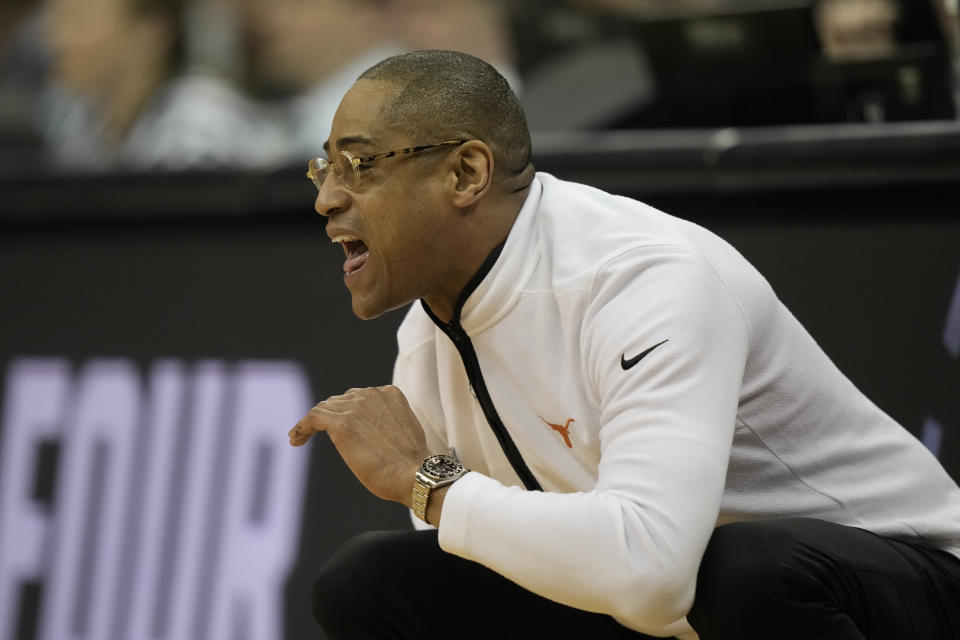 Texas head coach Rodney Terry yells in the first half of a Sweet 16 college basketball game against Xavier in the Midwest Regional of the NCAA Tournament Friday, March 24, 2023, in Kansas City, Mo. (AP Photo/Charlie Riedel)