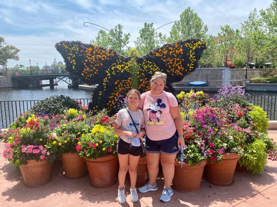 The author and her daughter at a Disney theme park