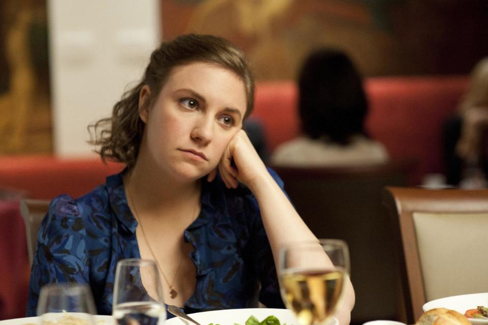 This undated image released by HBO shows Lena Dunham in a scene from the series "Girls." Dunham created, wrote, directed, produced and starred in a half-hour comedy series about 20-something adulthood, femininity and sexuality. (AP Photo/HBO, JoJo Whilden)