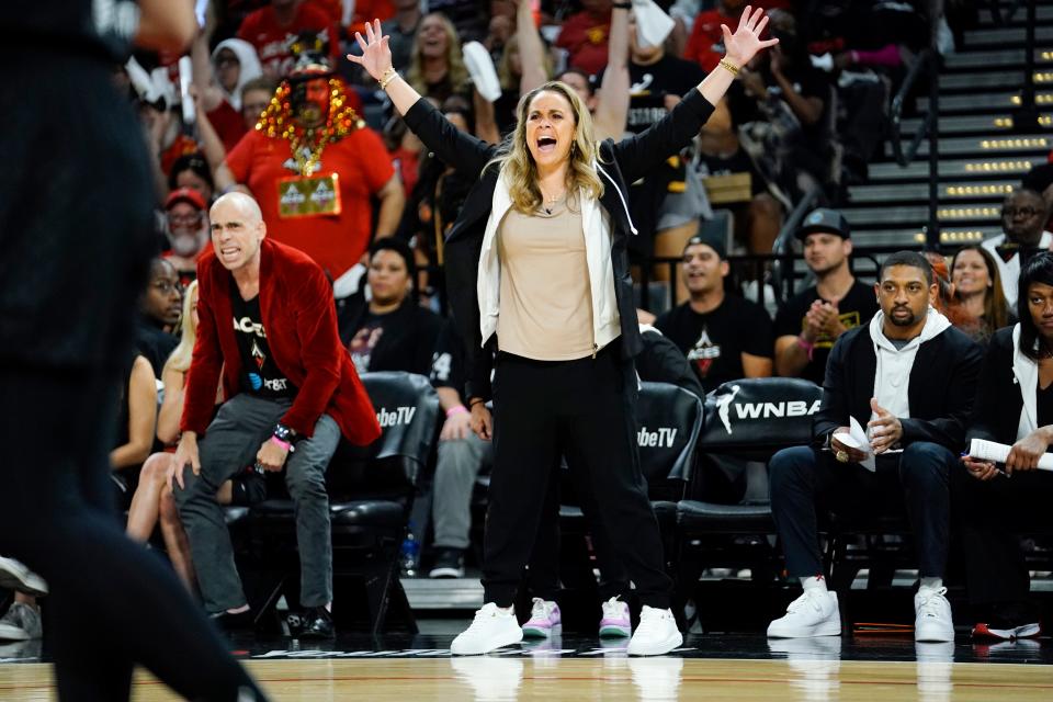 Aces coach Becky Hammon yells from the sideline during Sunday's game against Connecticut.