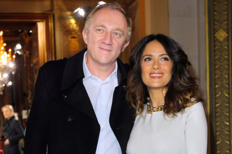 Pendiente de las tendencias. Salma Hayek, junto a su marido, Francois-Henri Pinault, no se quiso perder la nueva colección de Stella McCartney