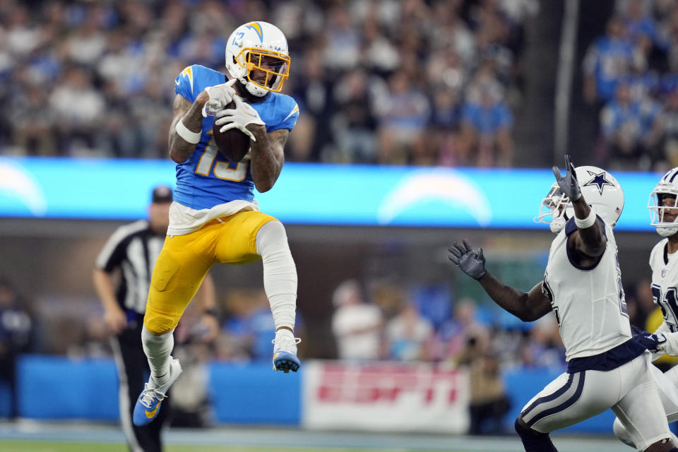 Los Angeles Chargers wide receiver Keenan Allen (13) makes a catch during the second half of an NFL football game against the Dallas Cowboys Monday, Oct. 16, 2023, in Inglewood, Calif. (AP Photo/Ashley Landis)