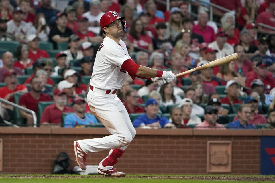 St. Louis Cardinals' Dylan Carlson hits a ground-rule double to score Tommy Edman during the fifth inning of a baseball game against the Miami Marlins Tuesday, June 28, 2022, in St. Louis. (AP Photo/Jeff Roberson)