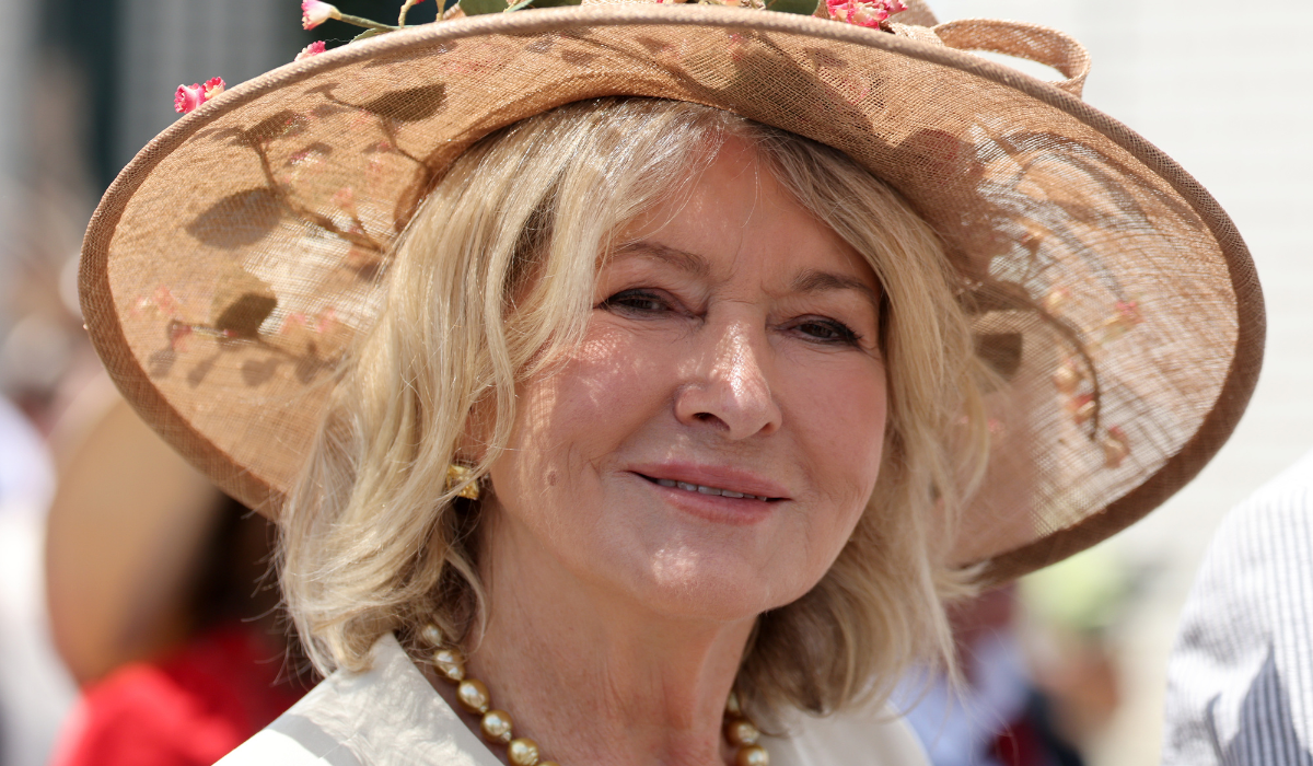 Martha Stewart wearing a straw hat