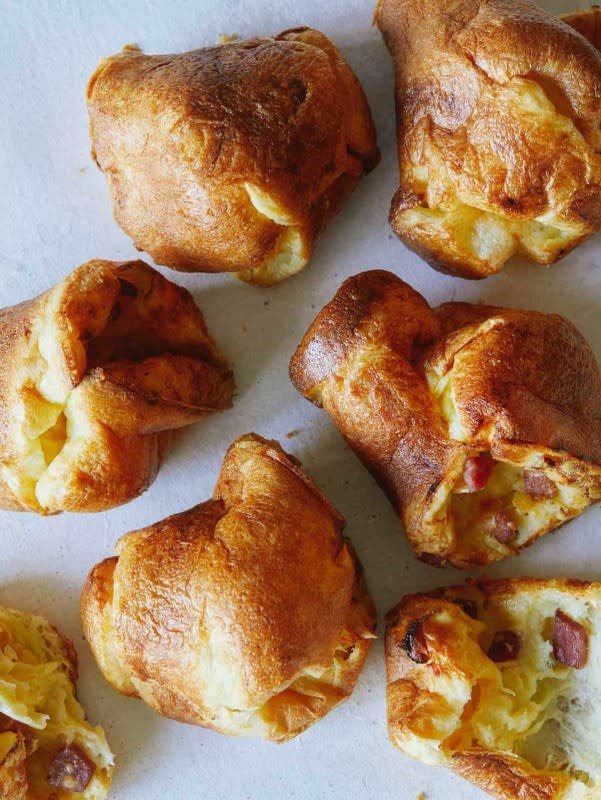 <p>Spoon Fork Bacon</p><p>Deliciously cheesy with little bits of sweet and salty ham and mild, melty Swiss that pairs so well with the custardy popovers.</p><p><strong>Get the recipe: <a href="https://www.spoonforkbacon.com/ham-and-cheese-popovers/" rel="nofollow noopener" target="_blank" data-ylk="slk:Ham and Cheese Popovers;elm:context_link;itc:0;sec:content-canvas" class="link rapid-noclick-resp">Ham and Cheese Popovers</a></strong></p>