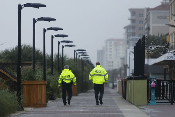 Officers of the Jacksonville Beach Police Department patrol as residents were alerted to evacuate the beaches in anticipation  of Hurricane Matthew, on Oct. 6 in Jacksonville Beach, Florida.