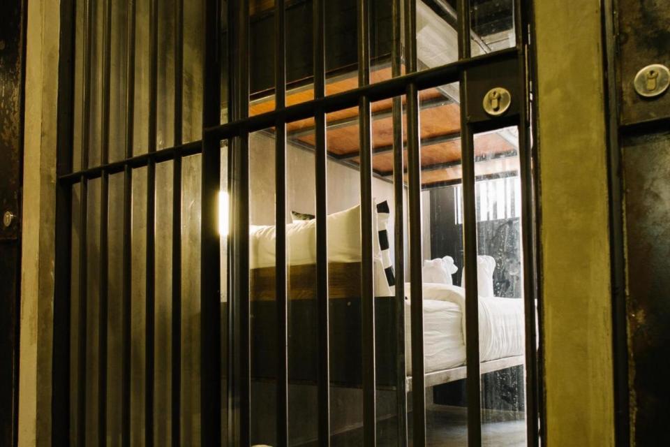 Rooms feature bunk beds, iron bars and metal doors (Sook Station)