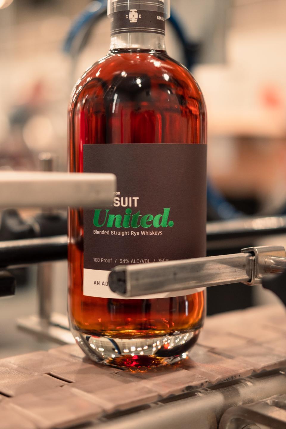 Pursuit Spirits United straight rye whiskey on the bottling line.