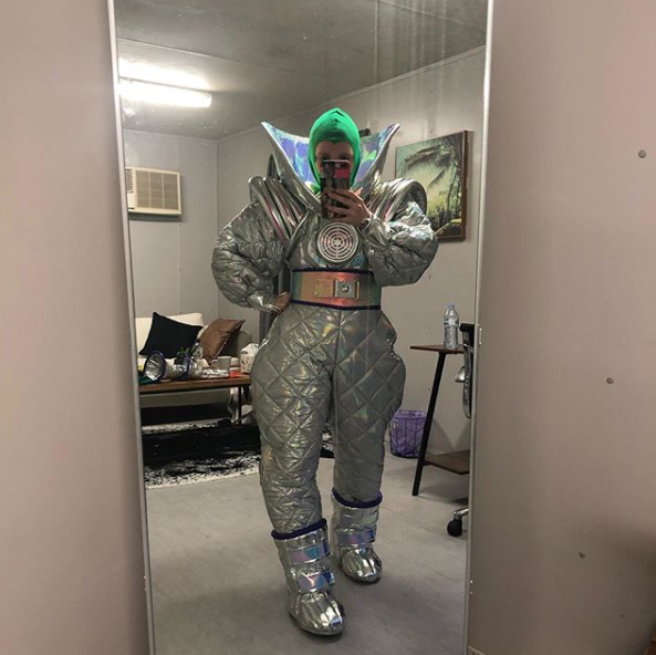 Nikki Webster in costume as Alien on The Masked Singer